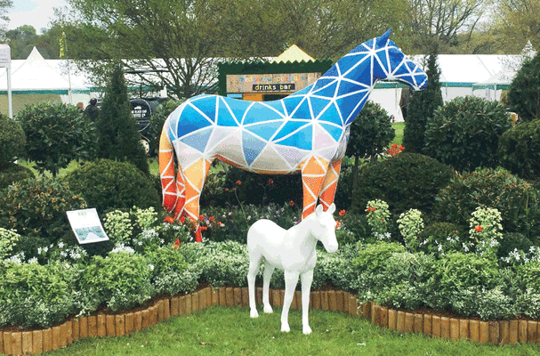 Herd of the Hospice is a public art installation of 25 uniquely painted life-sized horse sculptures