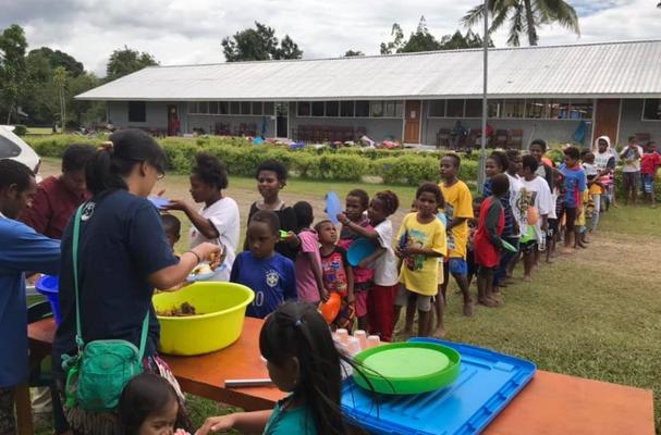 Papua Partners distributing food after the floods