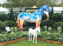 Herd of the Hospice is a public art installation of 25 uniquely painted life-sized horse sculptures