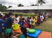 Papua Partners distributing food after the floods